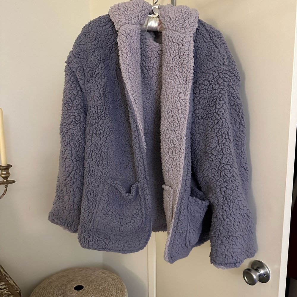 Reversible Teddy coat. New in perfect condition.